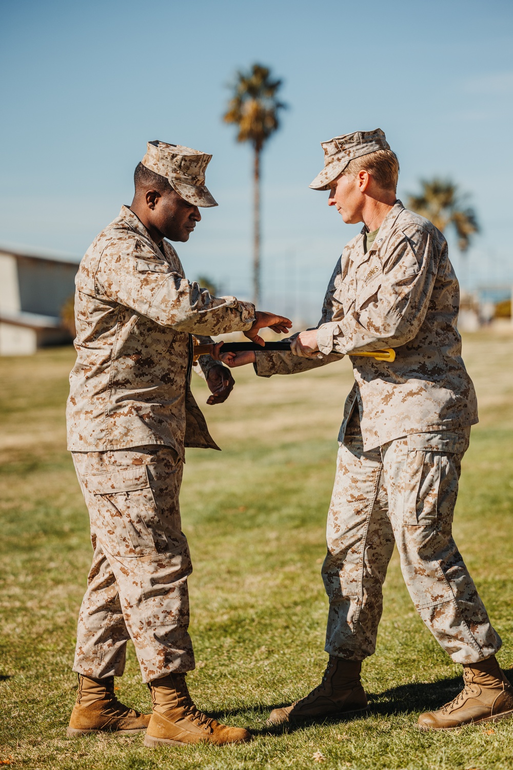 CLB 7 Sgt. Maj. James Foster is relieved by Sgt. Maj. Michael Allen during a relief and appointment ceremony