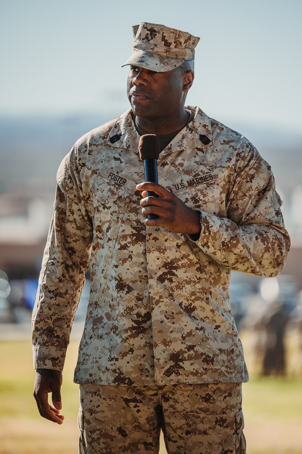 CLB 7 Sgt. Maj. James Foster is relieved by Sgt. Maj. Michael Allen during a relief and appointment ceremony