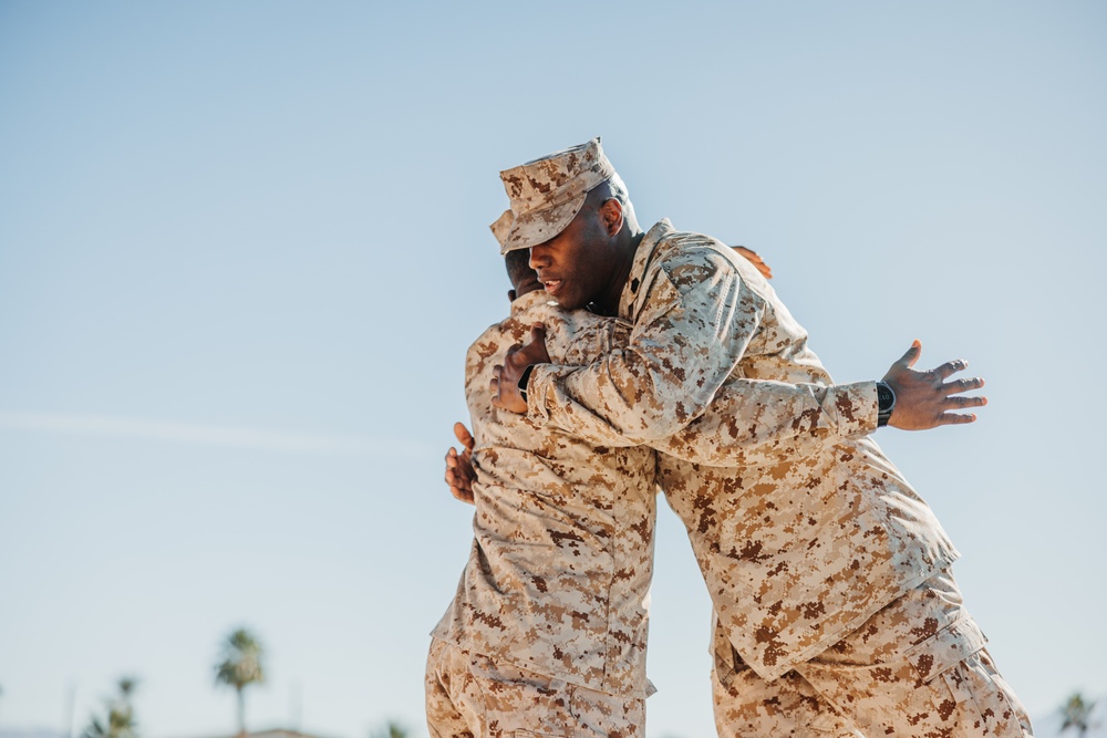 CLB 7 Sgt. Maj. James Foster is relieved by Sgt. Maj. Michael Allen during a relief and appointment ceremony