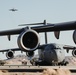 Marines with 3rd LAR load tactical vehicles onto Air Force C-17 Globemaster III cargo aircraft