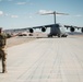 Marines with 3rd LAR load tactical vehicles onto Air Force C-17 Globemaster III cargo aircraft