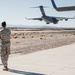 Marines with 3rd LAR load tactical vehicles onto Air Force C-17 Globemaster III cargo aircraft