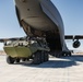 Marines with 3rd LAR load tactical vehicles onto Air Force C-17 Globemaster III cargo aircraft