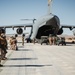 Marines with 3rd LAR load tactical vehicles onto Air Force C-17 Globemaster III cargo aircraft