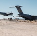 Marines with 3rd LAR load tactical vehicles onto Air Force C-17 Globemaster III cargo aircraft