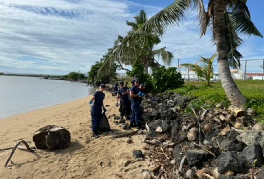 U.S. Coast Guard Cutter Harriet Lane cleans beach in American Samoa