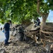 U.S. Coast Guard Cutter Harriet Lane cleans beach in American Samoa