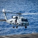 An MH-60R Sea Hawktakes off from the flight deck aboard Nimitz-class aircraft carrier USS Carl Vinson (CVN 70)