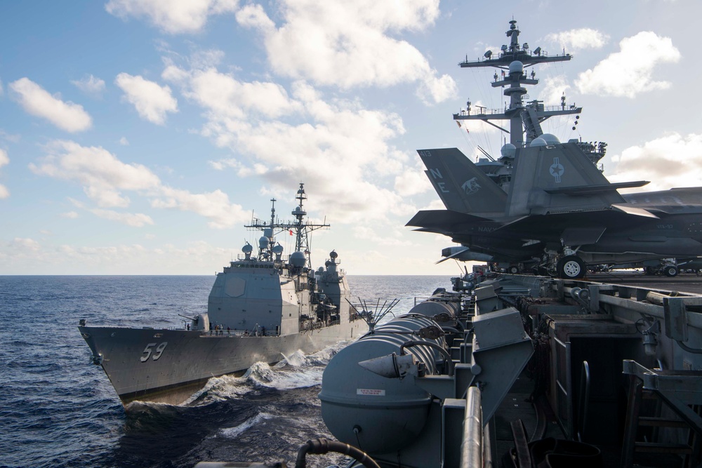 Nimitz-class aircraft carrier USS Carl Vinson (CVN 70) conducts a fueling-at-sea with Ticonderoga-class guided-missile cruiser USS Princeton (CG 59)