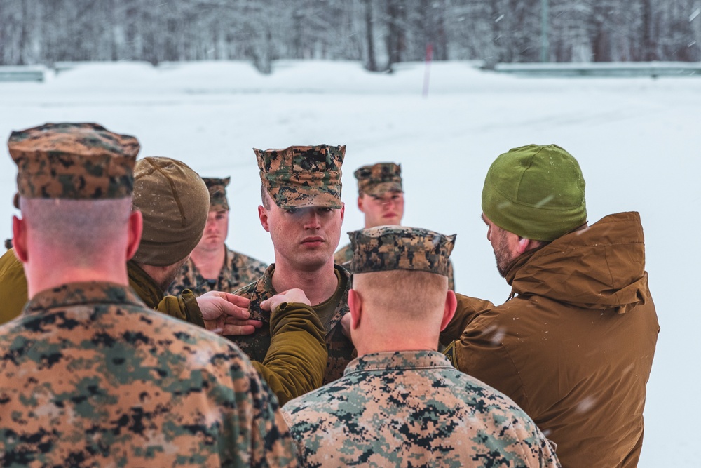 U.S. Marine pinned meritorious sergeant by members of the Norwegian Army