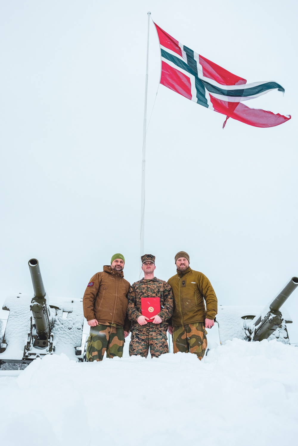 U.S. Marine pinned meritorious sergeant by members of the Norwegian Army