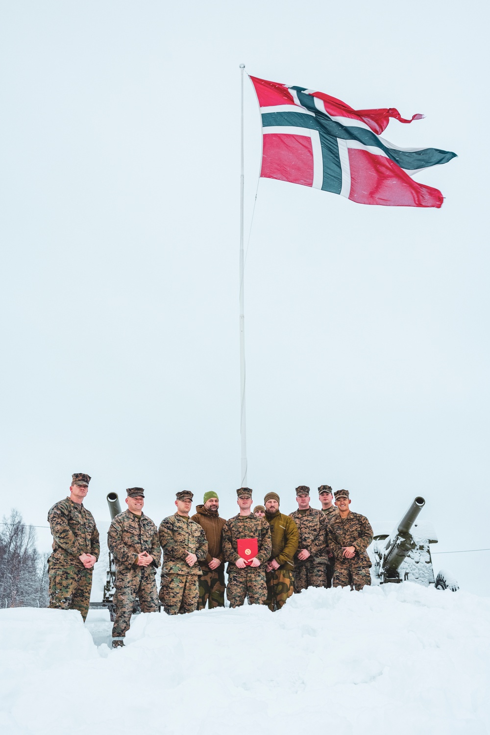 U.S. Marine pinned meritorious sergeant by members of the Norwegian Army