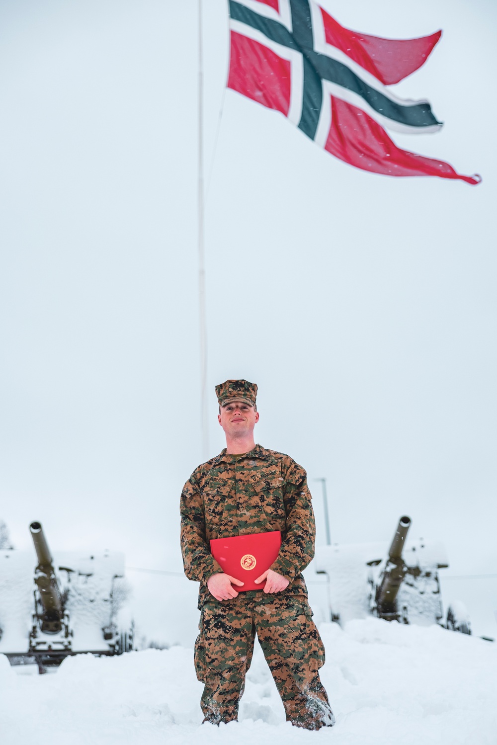 U.S. Marine pinned meritorious sergeant by members of the Norwegian Army