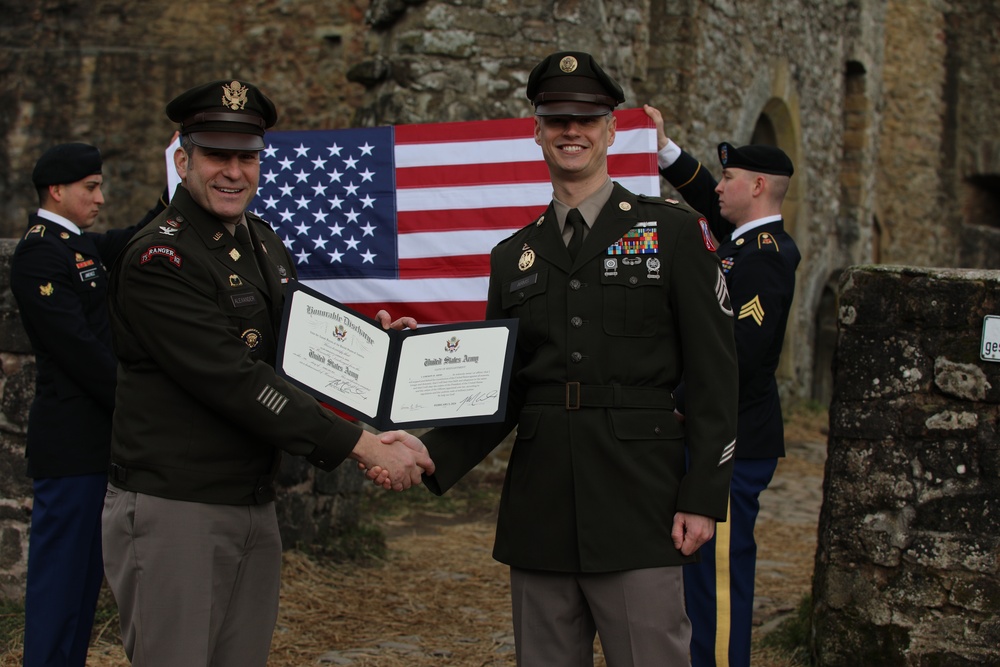 16th Sustainment Brigade reenlists U.S. Army Staff Sgt. Cameron Arms