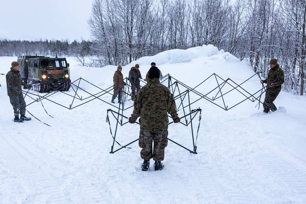 CLB-6 Participates in Polar Plunge as Part of Extreme Cold Weather Training Course