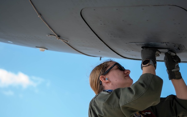 909th ARS refuels Navy P-8 Poseidon