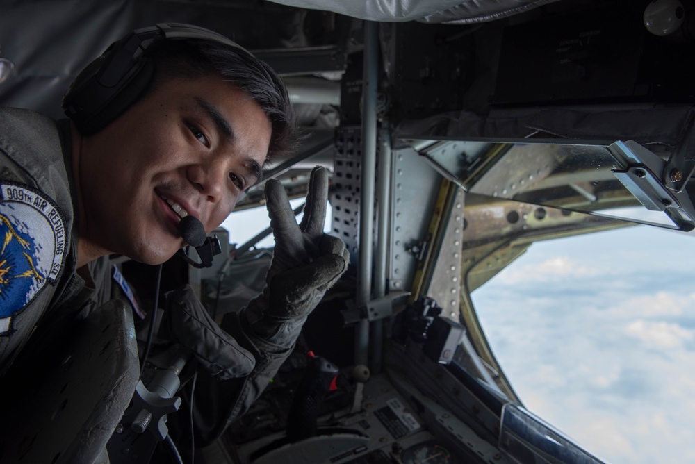 909th ARS refuels Navy P-8 Poseidon