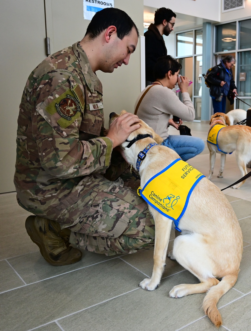 Canine Companions visit 129th Rescue Wing