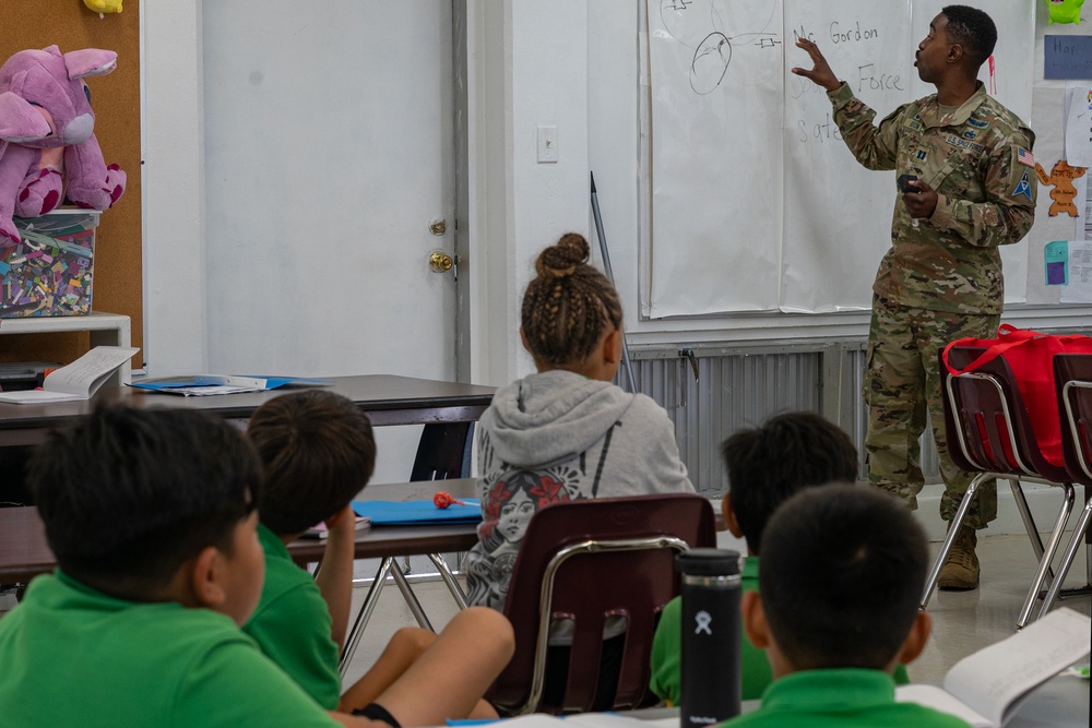 USSF member teaches kids about satellites