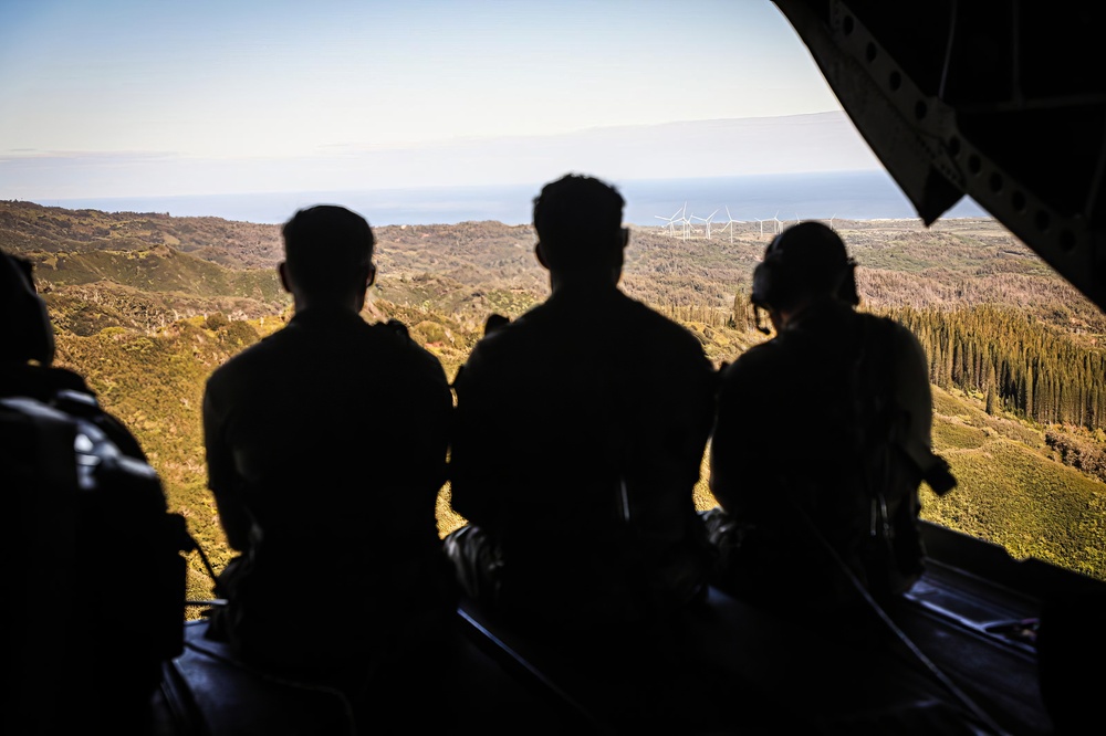 Bronco Soldiers Reenlist together on the back of a Chinook