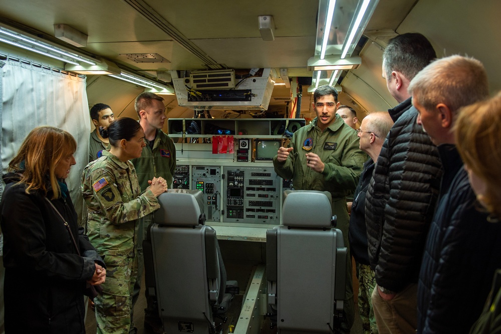 Naval Air Crewman (Mechanical) 2nd Class Gabrial Williams leads a guided tour of an E-6B Mercury as part of the USSTRATCOM Component Commanders Conference, Feb. 5, 2024.