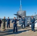 Members of the USSTRATCOM Component Commanders Conference) listen to Lt. Cmdr. Alex Sayers, executive officer, after completing a tour of USS Wyoming (SSBN 742), Feb. 5, 2024.