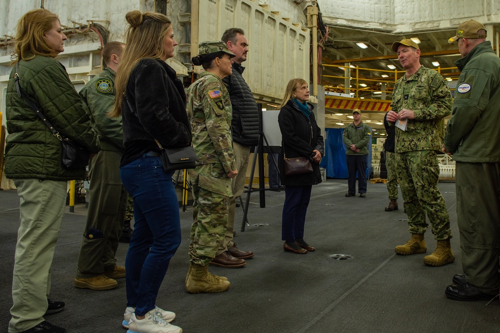 Members of the USSTRATCOM Component Commanders Conference participate in a guided tour of USS Gerald R. Ford (CVN 78) by Rear Adm. Erik Eslich, commander, Carrier Strike Group 12, Feb. 5, 2024.