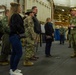 Members of the USSTRATCOM Component Commanders Conference participate in a guided tour of USS Gerald R. Ford (CVN 78) by Rear Adm. Erik Eslich, commander, Carrier Strike Group 12, Feb. 5, 2024.