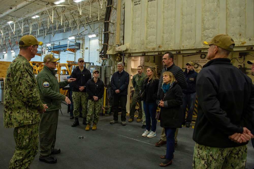 USS Gerald R. Ford (CVN 74) Commanding Officer Capt. Rick Burgess leads a ship's tour for members of USSTRATCOM Component Commanders Conference, Feb. 5, 2024.