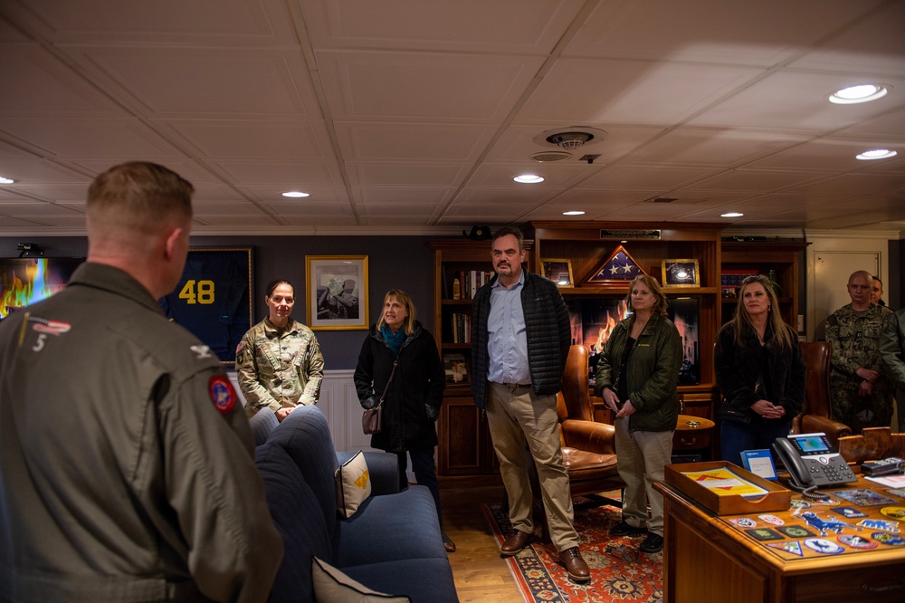 Members of the USSTRATCOM Component Commanders Conference speak with Capt. Richard Burgess, commanding officer, USS Gerald R. Ford (CVN 78), Feb. 5, 2024.