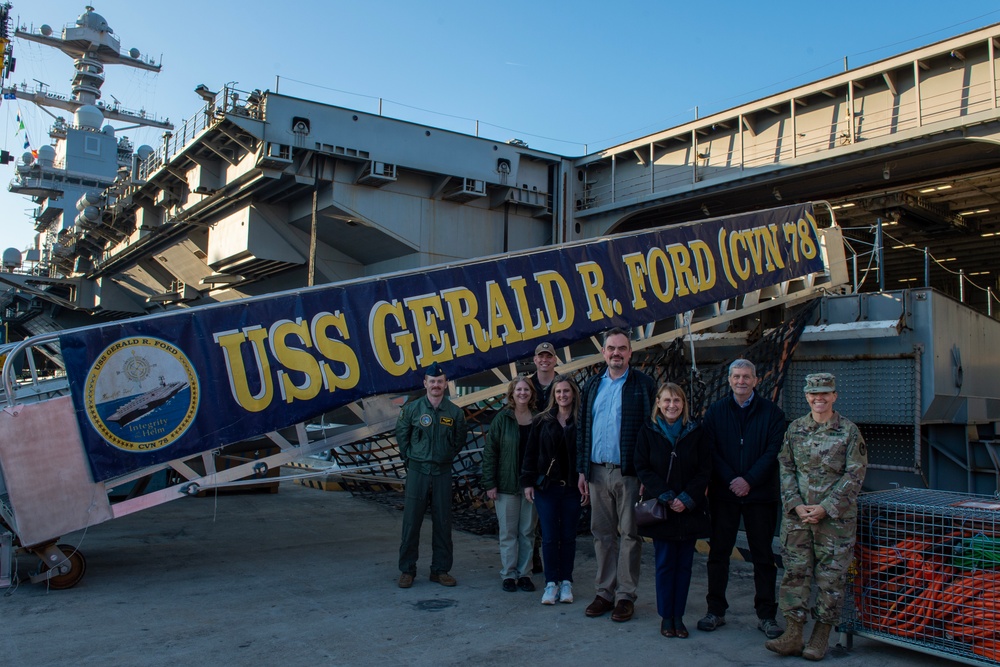 Members of the USSTRATCOM Component Commanders Conference pose for a photo following a tour of USS Gerald R. Ford (CVN 78), Feb. 5, 2024.