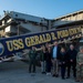 Members of the USSTRATCOM Component Commanders Conference pose for a photo following a tour of USS Gerald R. Ford (CVN 78), Feb. 5, 2024.