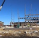 Steel framing underway on $28 million-plus transient training barracks project at Fort McCoy