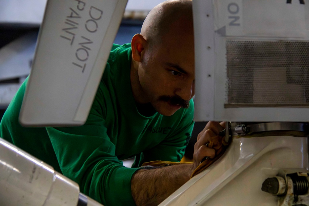 USS Carl Vinson (CVN 70) Sailor Conducts Maintenance