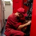 USS Carl Vinson (CVN 70) Sailor Inspects Gear