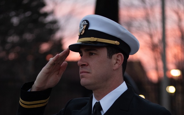 Lt. Joe Cardona Salutes During Evening Colors