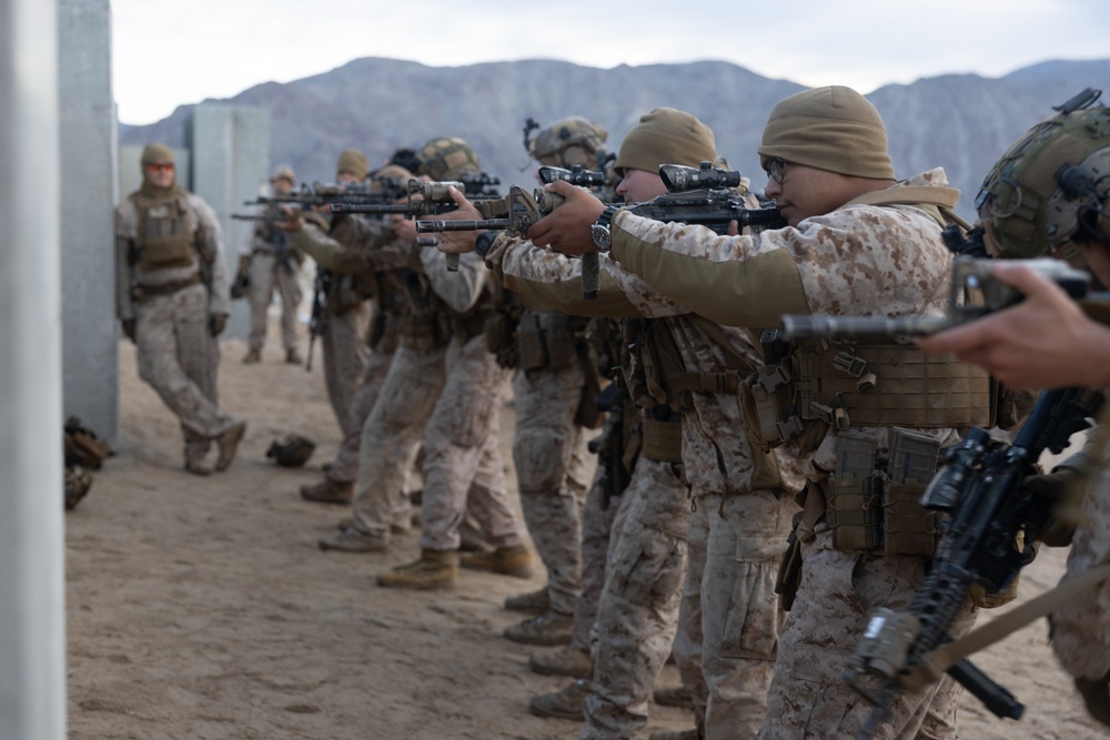 Marines with 1/4 conduct training on breaching and clearing urban terrain while participating in SLTE 2-24