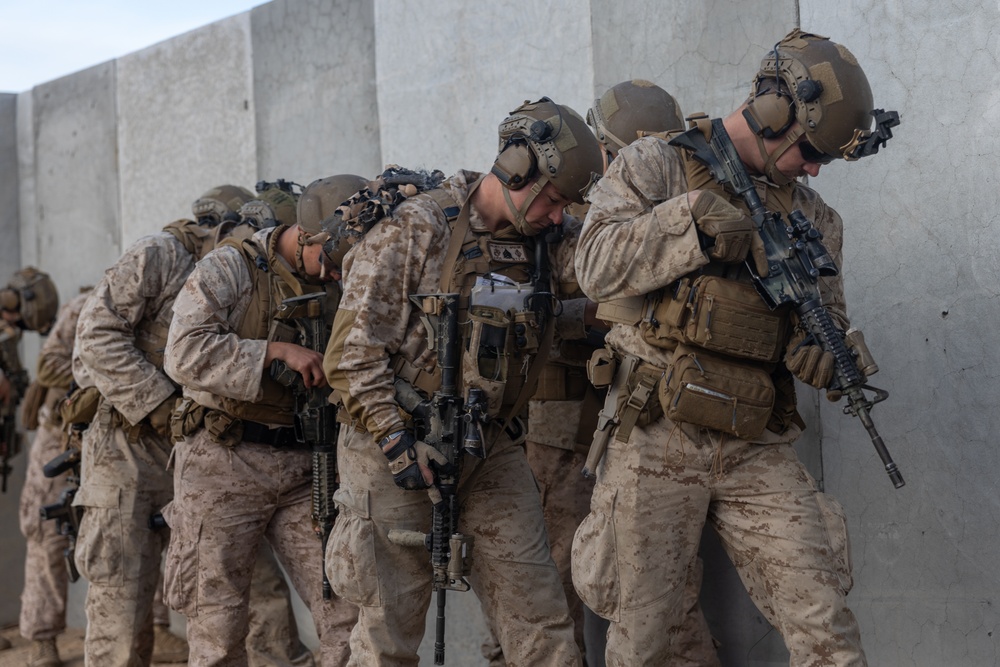 Marines with 1/4 conduct training on breaching and clearing urban terrain while participating in SLTE 2-24