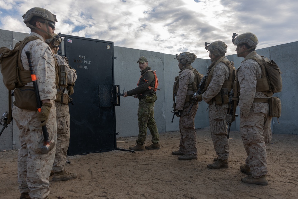 Marines with 1/4 conduct training on breaching and clearing urban terrain while participating in SLTE 2-24