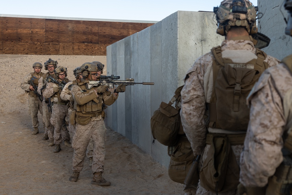 Marines with 1/4 conduct training on breaching and clearing urban terrain while participating in SLTE 2-24