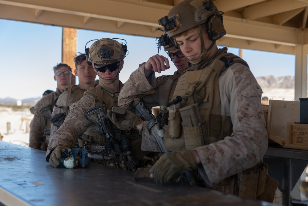 Marines with 1/4 conduct training on breaching and clearing urban terrain while participating in SLTE 2-24