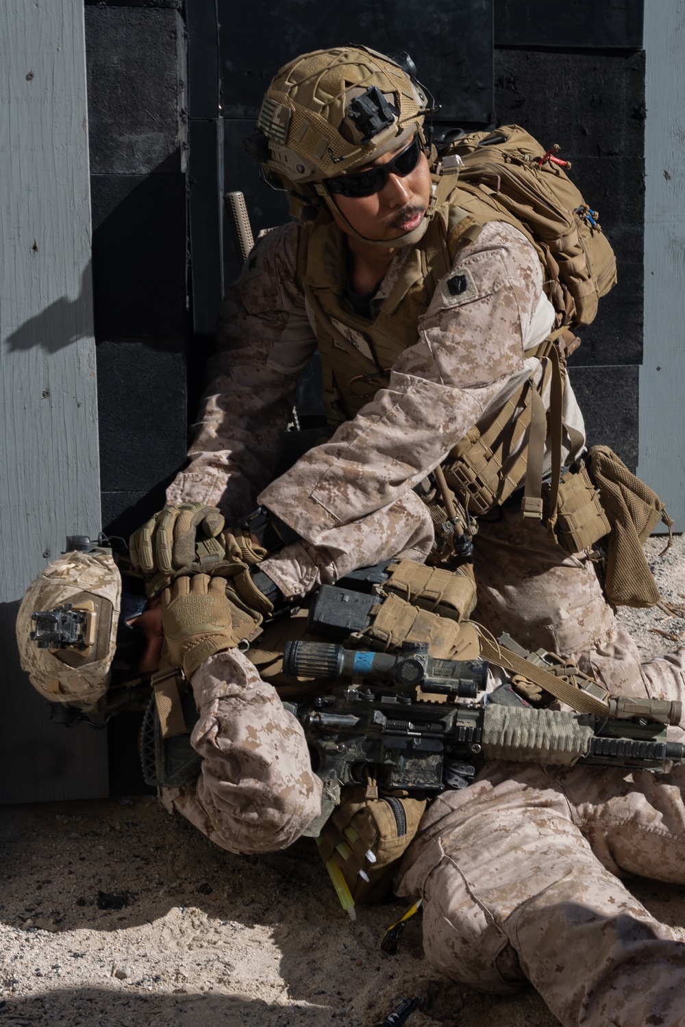 Marines with 1/4 conduct training on breaching and clearing urban terrain while participating in SLTE 2-24