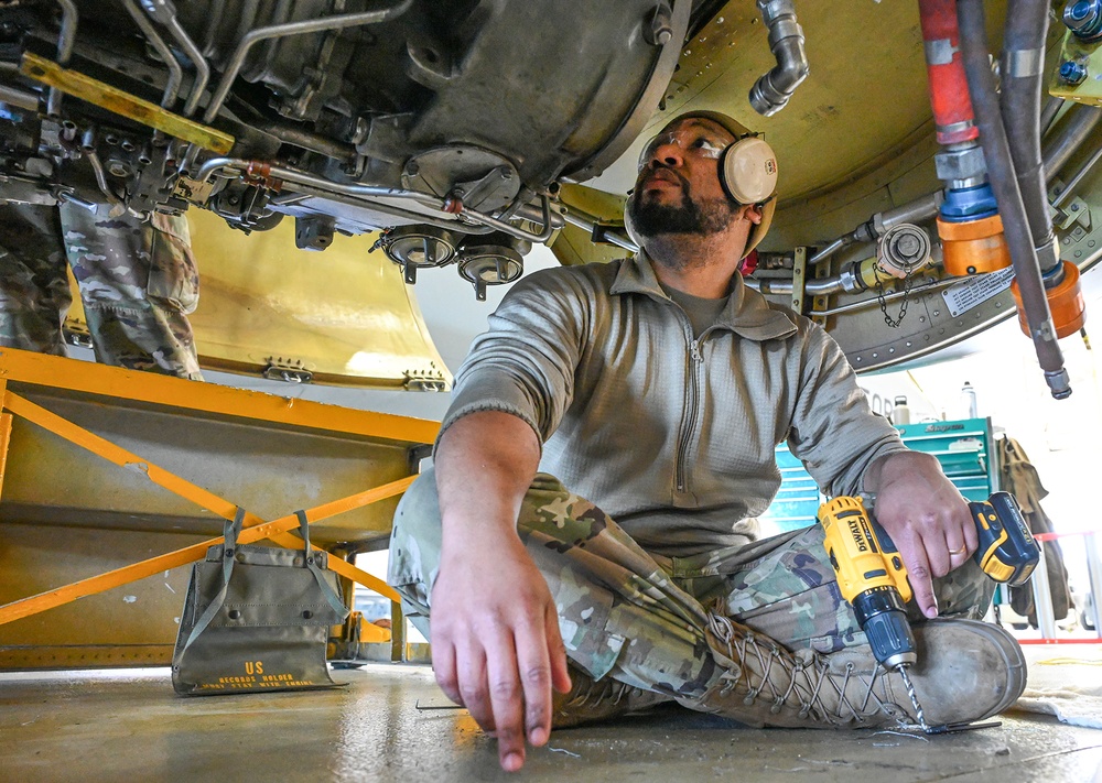 Airman Inspects Fasteners on Jet Engine at Selfridge Air National Guard Base