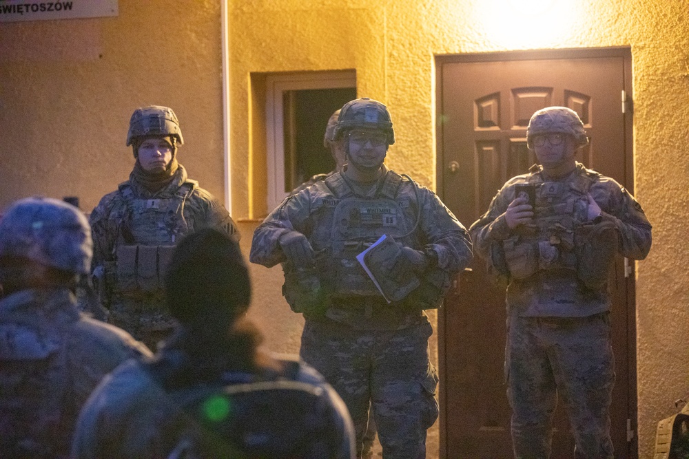 Task Force Provider Soldiers execute a convoy live fire exercise