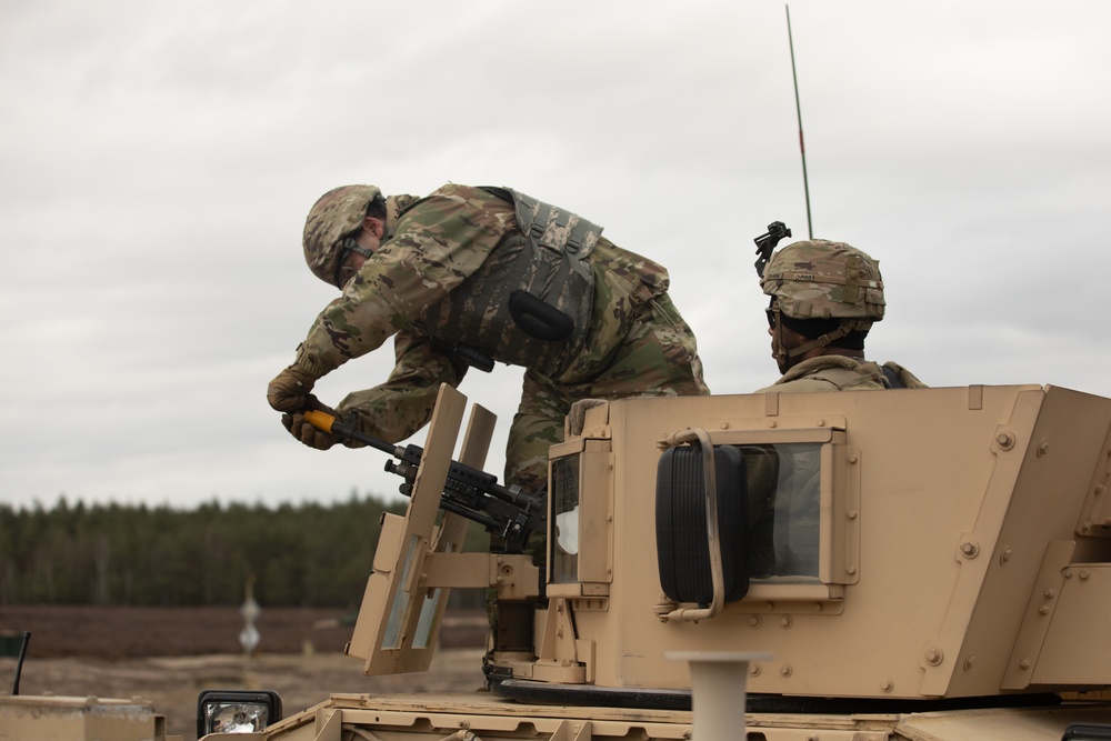 Task Force Provider Soldiers execute a convoy live fire exercise