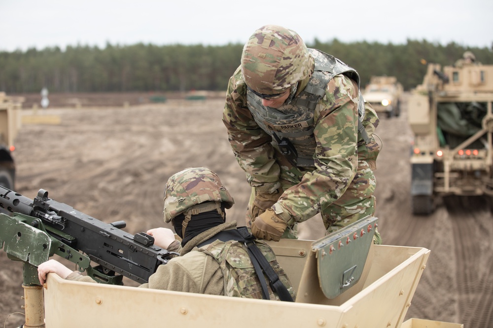 Task Force Provider Soldiers execute a convoy live fire exercise