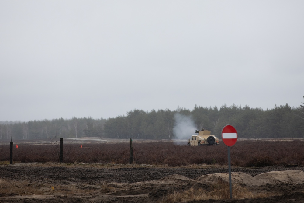 Task Force Provider Soldiers execute a convoy live fire exercise