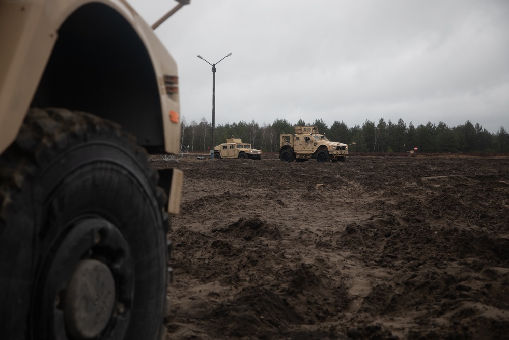 Task Force Provider Soldiers execute a convoy live fire exercise