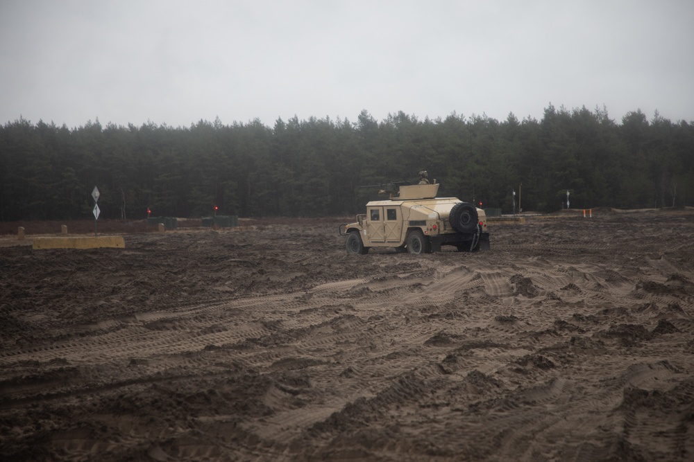 Task Force Provider Soldiers execute a convoy live fire exercise