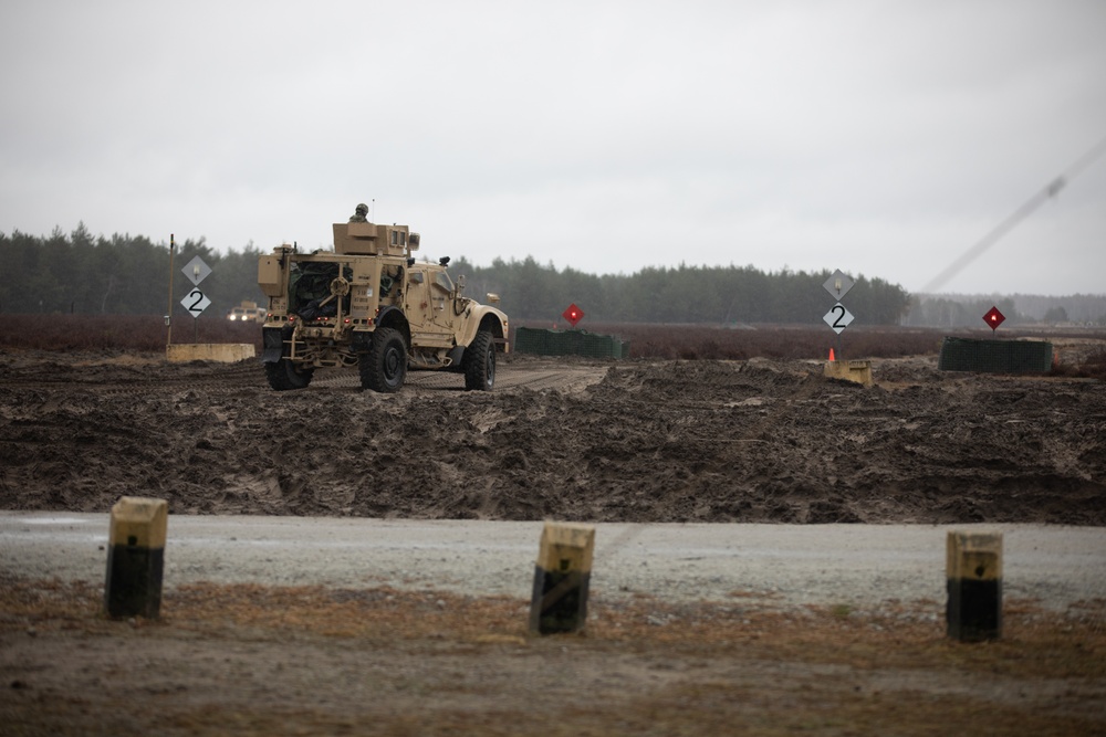 Task Force Provider Soldiers execute a convoy live fire exercise